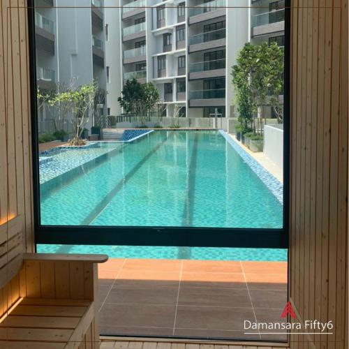View of 25m swimming pool from sauna room.
