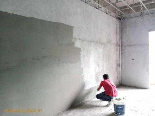 Block A - wall plastering in progress in unit. 