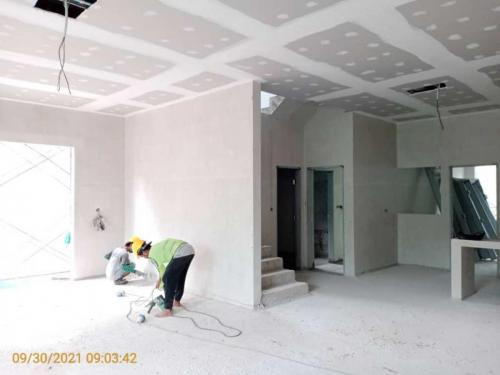 Block A - ceiling and plastering in progress in unit.