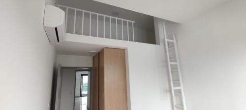 Block B - Bedroom loft with pullout ladder.
