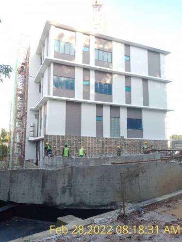 Block A - side view and  plastering works to the drop off area wall and ramp.