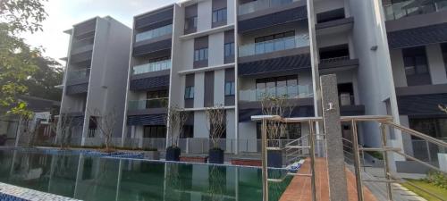 Swimming pool with Block A in the background. 