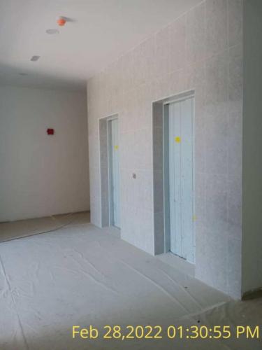 Block A - lift lobby, wall and floor tiles installed.