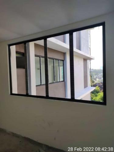 Block B - windows outer frames installation in progress.