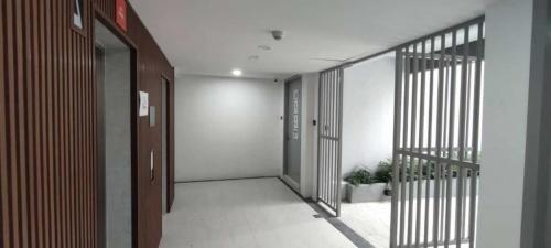 Common lift lobby with security grille gates.