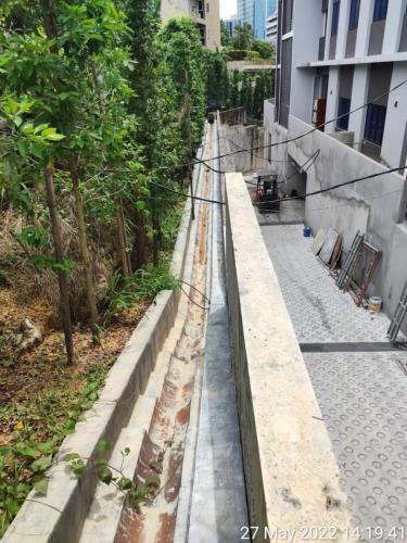 External drains completed and landscape trees planted.